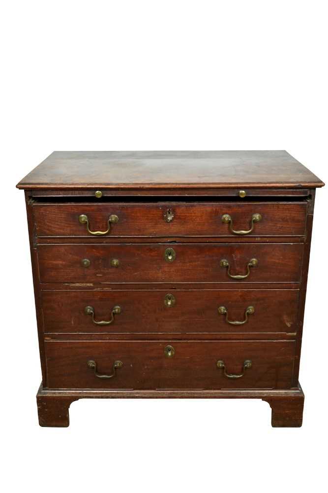 Lot 1379 - Early George III mahogany dressing chest, with moulded top and brushing slide over four graduated drawers on bracket feet, 83cm wide x 51cm deep x 79cm high