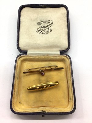 Lot 887 - Victorian 9ct gold pink stone and seed pearl bar brooch, together with 9ct gold 'Baby' brooch (2)