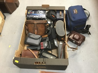 Lot 490 - One box containing various cameras and binoculars.