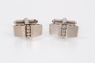 Lot 461 - Pair of white gold and diamond cufflinks