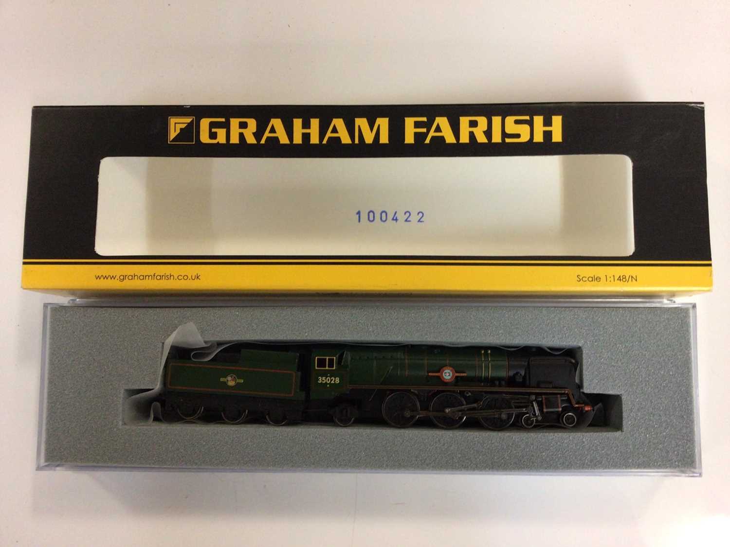 Lot 323 - Graham Farish N gauge locomotives including BR lined green late crest Clan Line 4-6-2 Merchant Navy Class tender locomotive 35028, boxed 372-302 and BR Express blue Early Emblem Merchant Navy Clas...