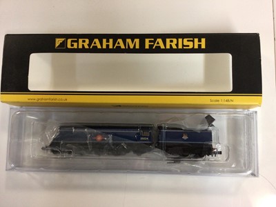 Lot 323 - Graham Farish N gauge locomotives including BR lined green late crest Clan Line 4-6-2 Merchant Navy Class tender locomotive 35028, boxed 372-302 and BR Express blue Early Emblem Merchant Navy Clas...