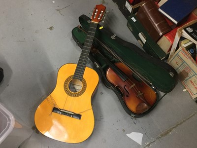 Lot 527 - A Hearld Classical Guitar, together with a students violin and bow in case (2)