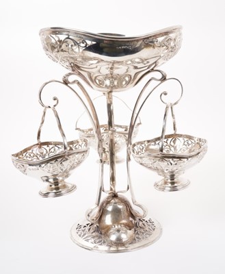 Lot 322 - George V silver épergne with three baskets.