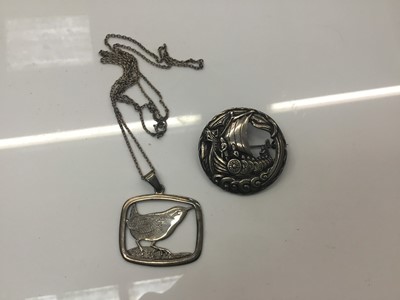 Lot 880 - Shetland Wren silver pendant and chain and a Scottish white metal brooch (2).