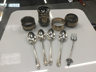 Lot 881 - Group of silver teaspoons, napkin rings and other items.