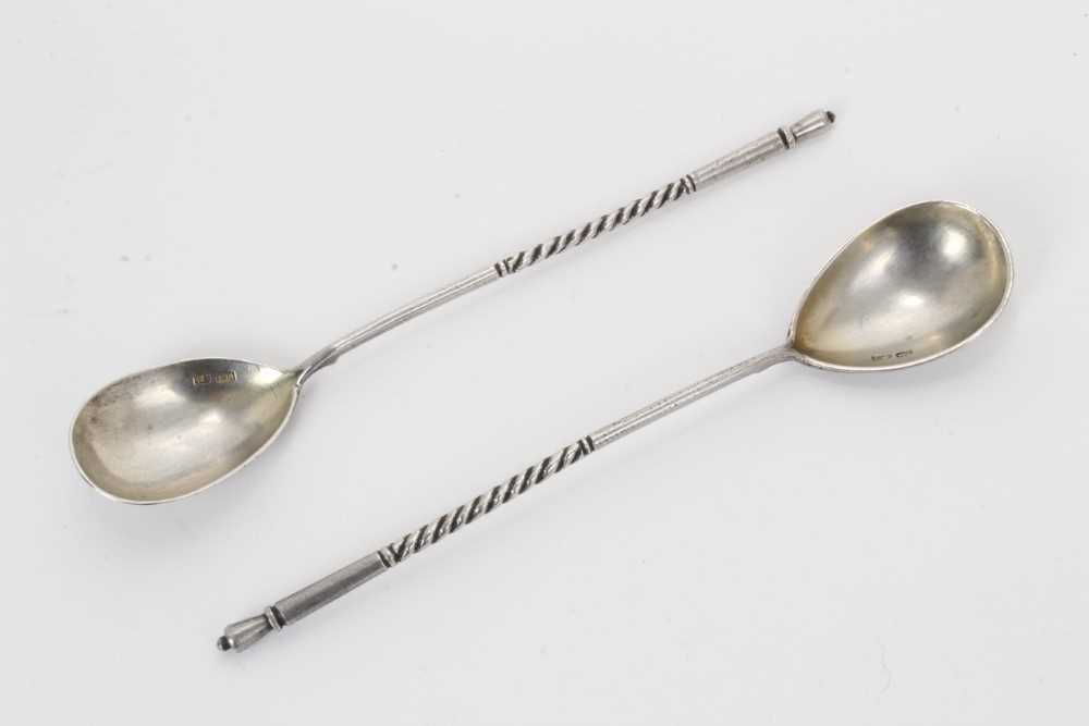 Lot 307 - Pair late Imperial Russian silver spoons, with teardrop bowls, engraved on the reverse and twisted stems. Bowls with 84 Zolotnik marks (1908 - 1917). 14.5cm overall length.