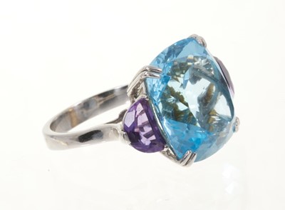 Lot 410 - 18ct white gold blue topaz and amethyst cocktail ring
