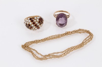 Lot 412 - 9ct gold garnet and seed pearl bombé dress ring, 9ct gold amethyst cocktail ring and 9ct gold chain