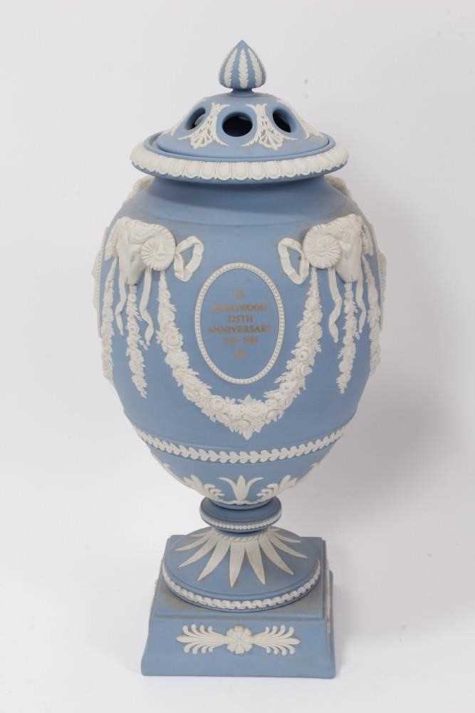 Lot 154 - A Wedgwood Jasper ware commemorative urn and cover, made for the 225th Anniversary of the Wedgwood factory in 1984, Ltd. ed. no. 42/225, 32cm high, in original box