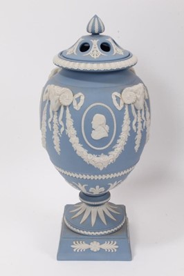 Lot 154 - A Wedgwood Jasper ware commemorative urn and cover, made for the 225th Anniversary of the Wedgwood factory in 1984, Ltd. ed. no. 42/225, 32cm high, in original box