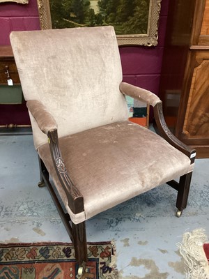 Lot 1444 - 19th century Gainsborough style open armchair, of broad proportions, raised on square carved mahogany legs and castors