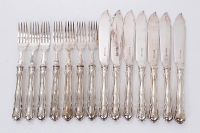 Lot 341 - Set of seven pairs of silver plated fish eaters, handles stamped CTR.