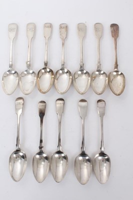Lot 346 - Twelve Georgian and later silver Fiddle pattern able spoons, mostly with engraved initials