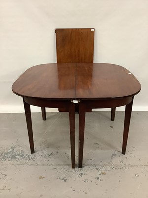 Lot 1469 - George III mahogany dining table with one additional leaf