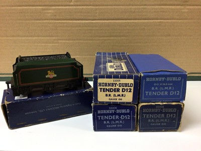 Lot 287 - Hornby Dublo OO gauge BR green with Early Emblem D12 tenders (x5), similar D11 tenders (x2) and LMS D2 tender, all boxed plus two LMS unboxed tenders (10 total)