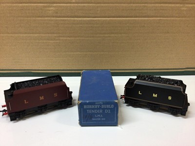 Lot 287 - Hornby Dublo OO gauge BR green with Early Emblem D12 tenders (x5), similar D11 tenders (x2) and LMS D2 tender, all boxed plus two LMS unboxed tenders (10 total)