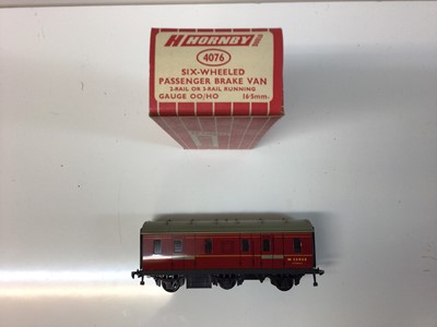 Lot 288 - Hornby Dublo OO gauge rolling stock including Horse Boxes, goods brake vans, ventilated vans, passenger fruit vans, 4 wheel utility vans, high capacity wagons and bogie tanker (25 total)