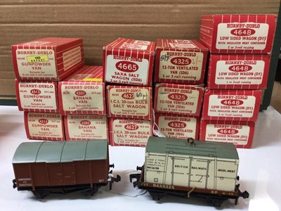 Lot 289 - Hornby Duplo OO gauge rolling stock including Gunpower, Banana, blue spot fish and ventilated vans and low sided, sand, salt, cattle and tank wagons, all red boxes, (32 total)