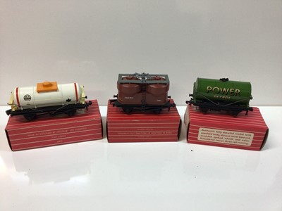 Lot 289 - Hornby Duplo OO gauge rolling stock including Gunpower, Banana, blue spot fish and ventilated vans and low sided, sand, salt, cattle and tank wagons, all red boxes, (32 total)