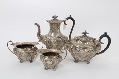 Lot 385 - George V silver four piece tea set