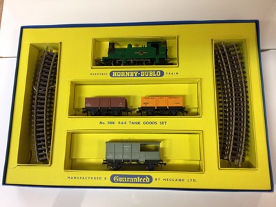 Lot 295 - Hornby Duplo OO gauge Set 2006 2 rail train pack with BR green 0-6-0 tank locomotive, three wagons and track, boxed, T.P.O. mail Van Set, boxed 2400 and The Royal Scot corridor coach (3)