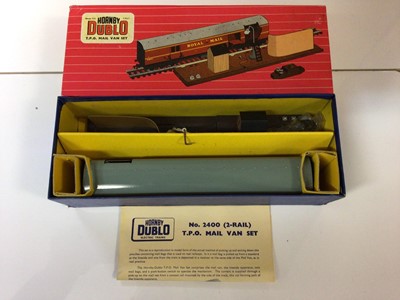 Lot 295 - Hornby Duplo OO gauge Set 2006 2 rail train pack with BR green 0-6-0 tank locomotive, three wagons and track, boxed, T.P.O. mail Van Set, boxed 2400 and The Royal Scot corridor coach (3)