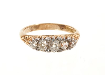 Lot 520 - Late Victorian diamond five stone ring with five graduated old cut diamonds in carved gold setting on plain gold shank, estimated total diamond weight approximately 0.75cts, ring size P.