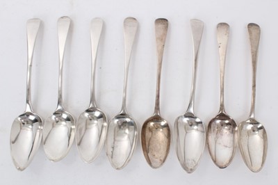 Lot 360 - Collection of eight Georgian and later silver Old English pattern table spoons