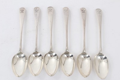 Lot 367 - Set of six George III silver Old English pattern dessert spoons, with armorial crests