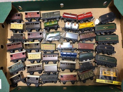 Lot 304 - Railway selection of OO gauge tinplate rolling stock and tenders (approx 120)