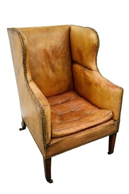 Lot 1479 - 19th century leather  upholstered wing armchair