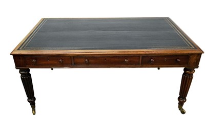 Lot 1478 - Large 19th century library table on reeded supports and castors