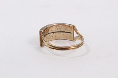 Lot 409 - George III gold and paste ring with two rows of paste stones in closed-back silver collet setting on bifurcated gold shoulders on reeded gold shank. Ring size L½.