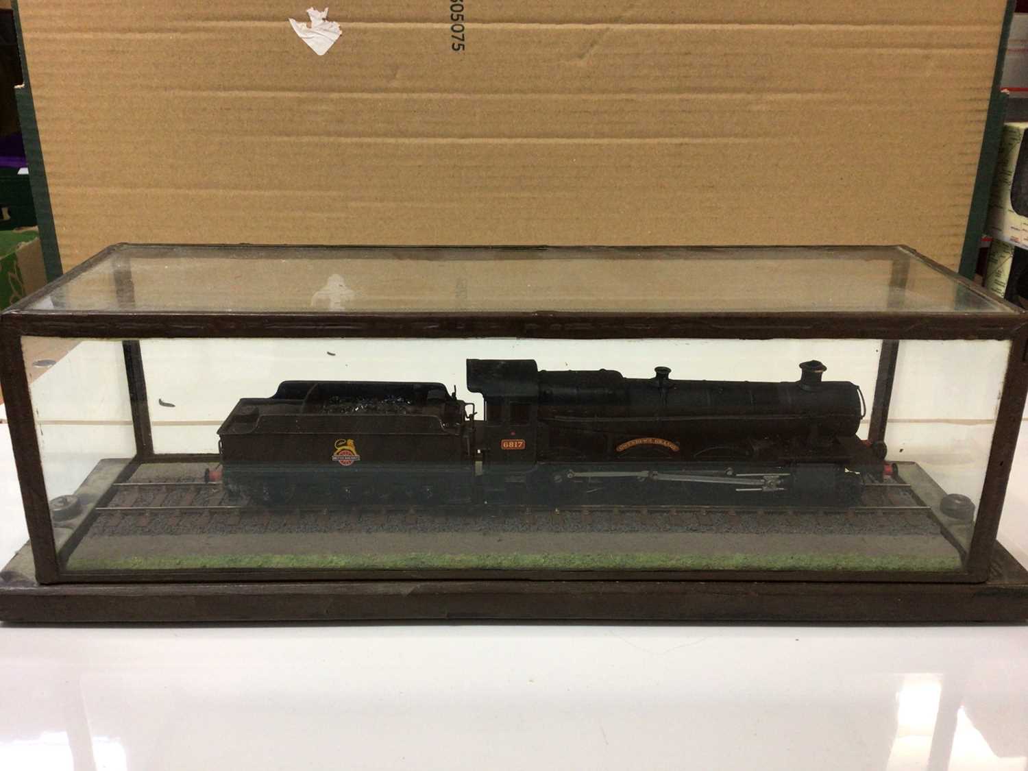 Lot 315 - Railway OO gauge mounted BR black Early Emblem 4-6-0 "Gwenddwr Grange" tender locomotive 6817, in display case, plus Exclusive First Editions Bakerloo London Transport rail cars and various constru...