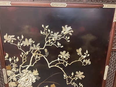 Lot 1406 - Fine quality Japanese Meiji period hardwood and shibayama inlaid two fold screen, with ornate panels of birds and foliage, the left central panel with signature plaque, within gently arched lattice...