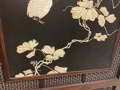 Lot 1406 - Fine quality Japanese Meiji period hardwood and shibayama inlaid two fold screen, with ornate panels of birds and foliage, the left central panel with signature plaque, within gently arched lattice...