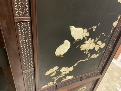 Lot 1406 - Fine quality Japanese Meiji period hardwood and shibayama inlaid two fold screen, with ornate panels of birds and foliage, the left central panel with signature plaque, within gently arched lattice...