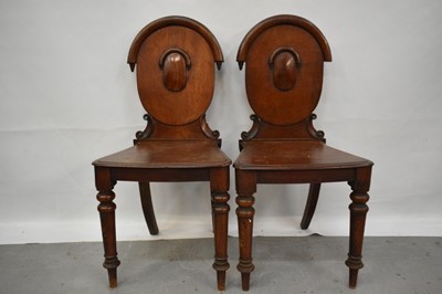 Lot 1100 - Pair of Victorian mahogany hall chairs