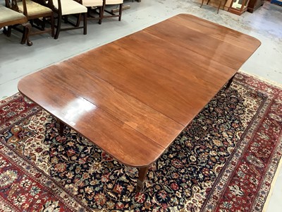 Lot 1495 - 19th century mahogany concertina action extending dining table with three extra leaves