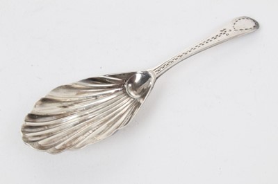 Lot 375 - George III silver caddy spoon, with shell bowl and bright cut handle (London 1786) possibly Thomas Evans. 10.5cm overall length.