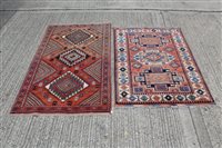 Lot 1211 - Persian-style rug with three geometric...