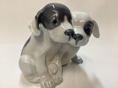 Lot 1115 - Four Royal Copenhagen porcelain models of Dogs, number 260, 058, 3476 and 3080