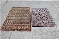 Lot 1213 - Eastern rug with rows of conjoined medallions...