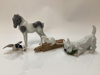 Lot 1120 - Four Royal Copenhagen porcelain models - Mouse on corn Cob number 512, Foal standing 4653, Dog with slipper 3476 and Mallard