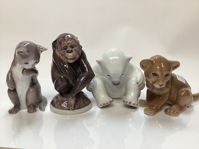 Lot 1121 - Four Bing & Grondahl porcelain models - Monkey number 1055, Polar Bear 2536 and Kitten 2516