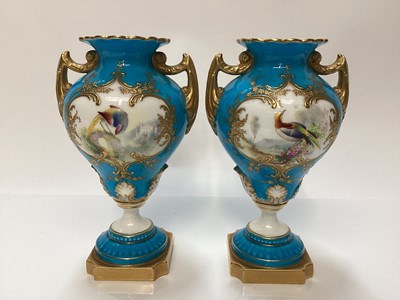 Lot 1123 - Coalport limited edition Battle of Britain two handled vase hand painted by Malcolm Harnett, number 10 of 50, on plinth base, 32cm high, together with a pair of Royal Worcester blue and gilt vases,...