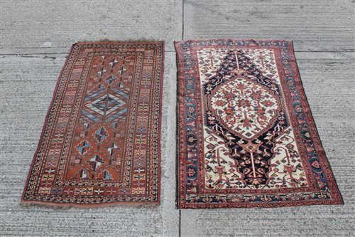 Lot 1215 - Persian-style rug with central medallion...