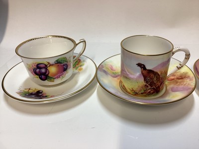 Lot 1145 - Collection of eleven Royal Worcester cabinet cups and saucers including Game Birds by James Stinton, London Scenes by Harry Davis, Brambles by Kitty Blake, Worcester Fruit by Richard Sebright etc
