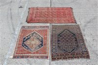 Lot 1216 - Tekke-style rug with three rows of eight...